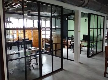 Clear glass, French door style cubicles, for a shipping company in AZ