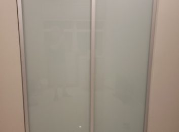 Closet doors, Silver frames, milky glass, 2 panels, 60w by 96h $1130