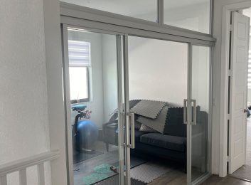 Residential room divider with transom
